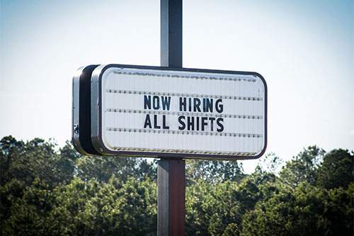 Studies show modest job gains from U.S. states' benefit cuts